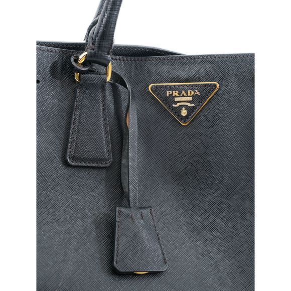 Good Condition Prada Black Leather Handbag with Gold-Tone Hardware Bags